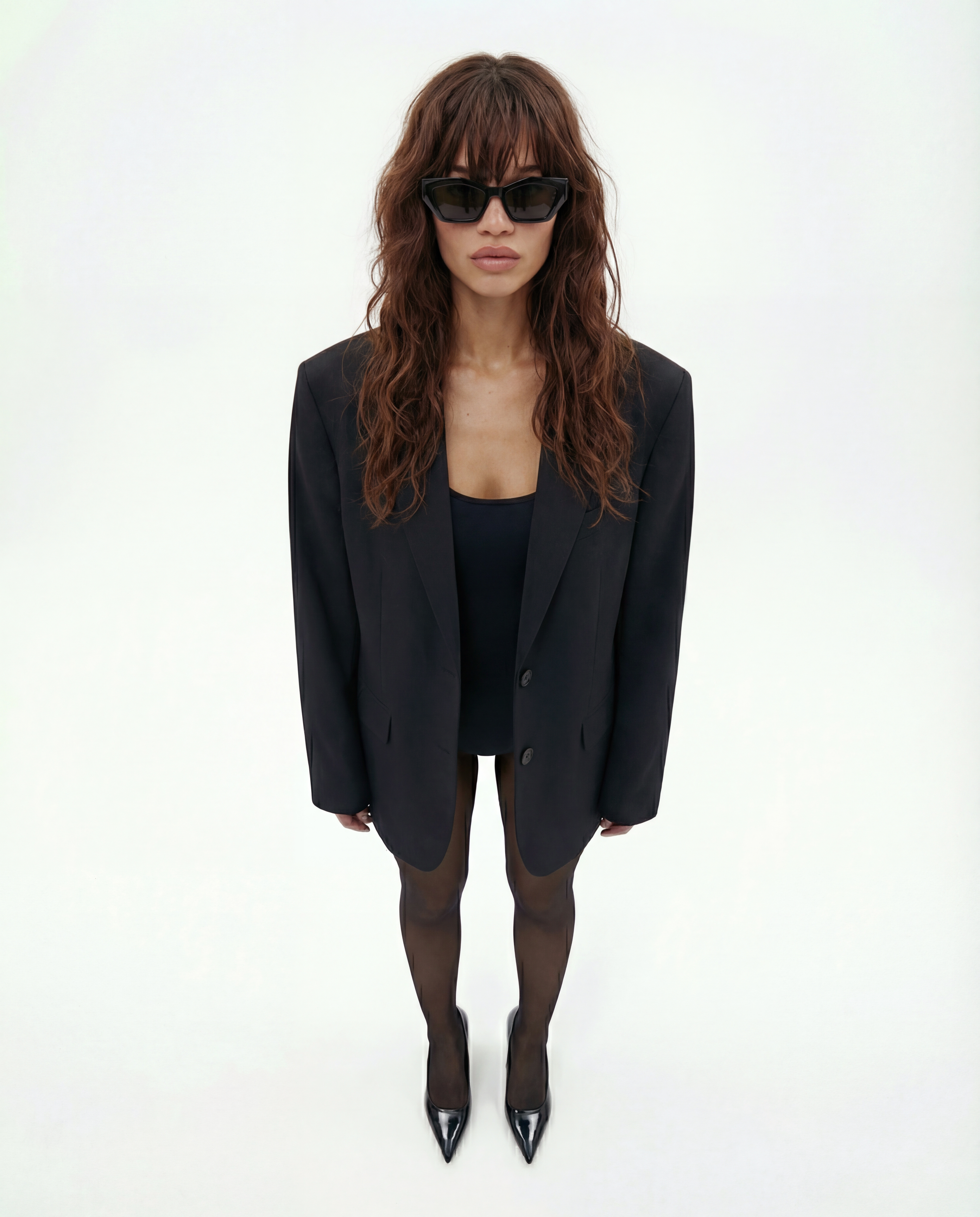Model standing in sunglasses